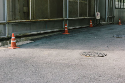 Street light on road by building