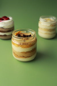 Close-up of cake in jar on table