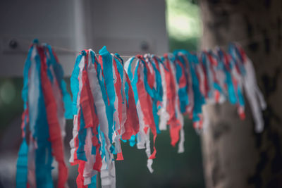 Close-up of textile hanging on rope outdoors