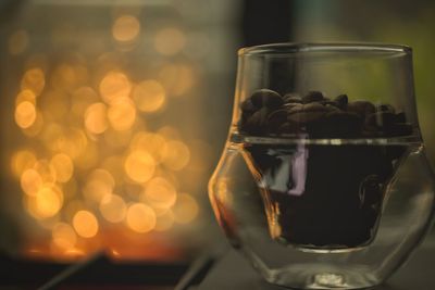 Close-up of drink in glass jar on table