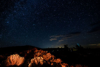 Scenic view of star field against sky at night