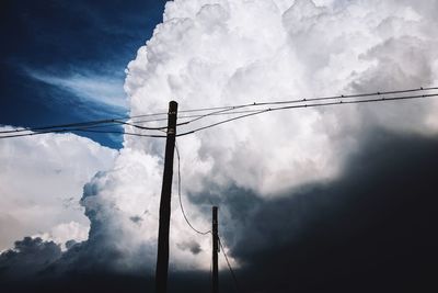 Low angle view of vapor trail against sky