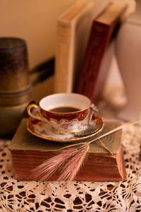 Close-up of coffee cup on table