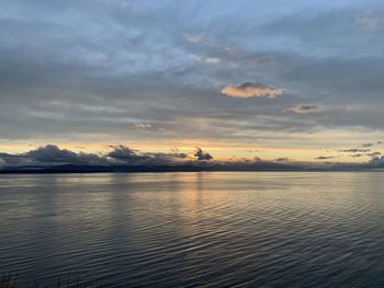 Sunset over an ocean in a bay on whidbey island