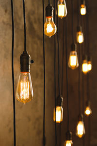 Low angle view of illuminated light bulb