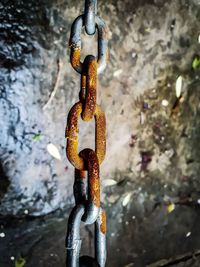 Close-up of padlock on chain