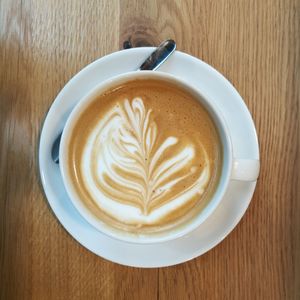 High angle view of cappuccino on table