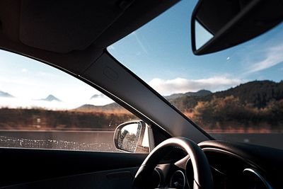 Reflection of car on road