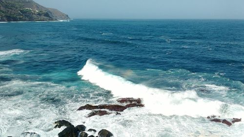 Scenic view of sea against clear sky