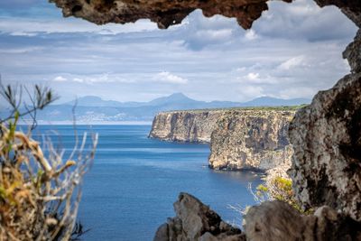 Scenic view of bay against sky