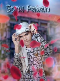 Portrait of young woman wearing hat