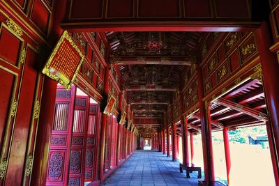 Corridor architecture in a palace in hue in central vietnam.  this place used to be a symbol 