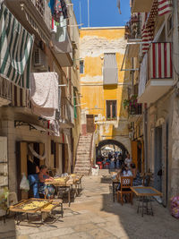 The housewives in bari vecchia prepare the apulian orecchiette directly in the street.