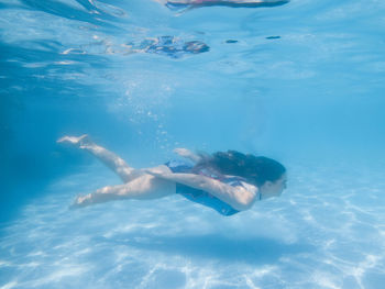 Full length of woman in swimming pool