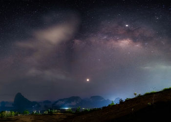 Scenic view of star field against sky at night