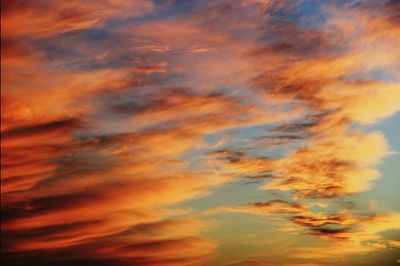 Scenic view of dramatic sky at sunset