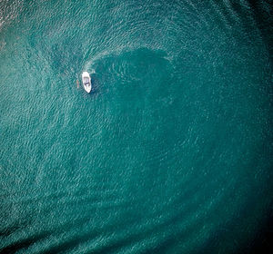 High angle view of ship sailing on sea