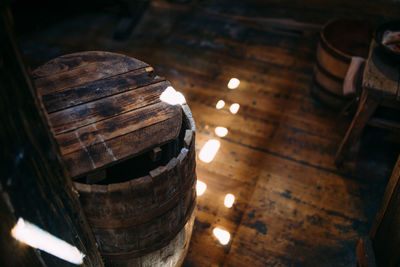 Wooden winch of a sailing ship and ropes on the deck of medieval pirate warship