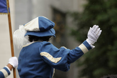 Close-up of boy holding umbrella