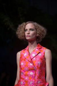 Portrait of a beautiful young woman looking away