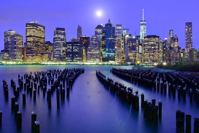 Buildings by river