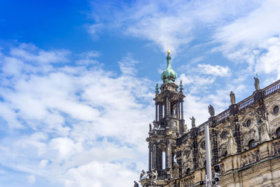 Low angle view of statue against cloudy sky