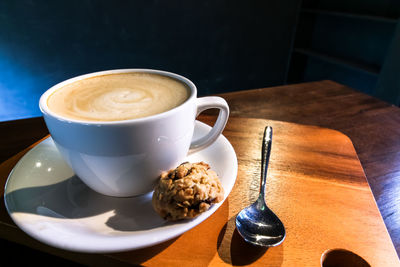 Coffee and cup on table