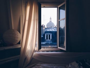 Buildings seen through bedroom window