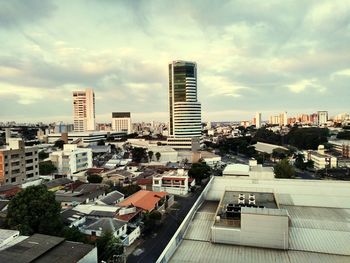 High angle view of buildings in city against sky