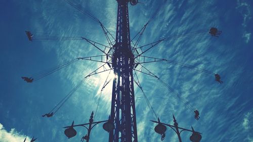 Low angle view of silhouette tree against sky