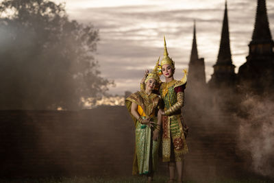 Khon, is a classical thai dance in mask. except for these two characters who weren't wearing masks.