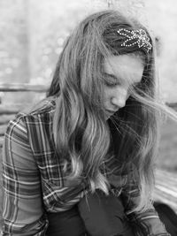 Portrait of young woman wearing hat