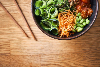 High angle view of chopped vegetables in bowl on table