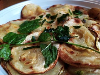 Close-up of pizza served in plate