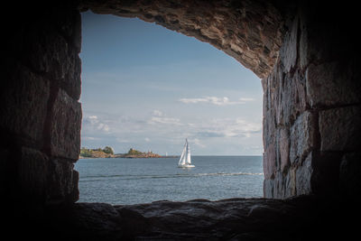 View of sailboat in sea against sky