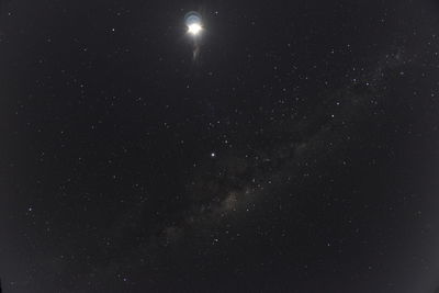 Low angle view of stars against sky at night