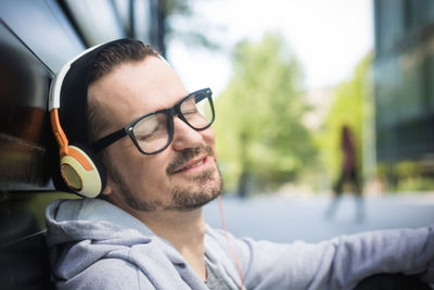 Portrait of young man wearing eyeglasses