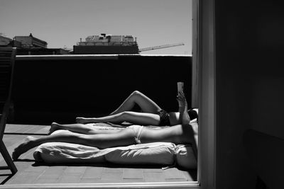 Low section of people relaxing in balcony