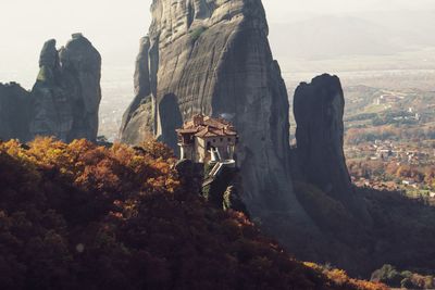 Rock formation on mountain against sky