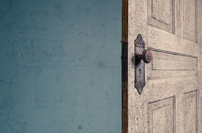 Wooden door against wall