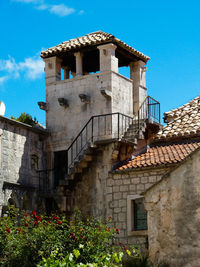 Low angle view of historic building against sky