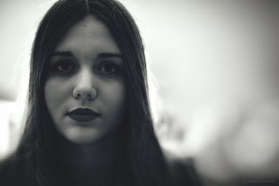 Close-up portrait of young woman