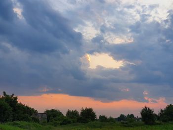 Scenic view of landscape against sky during sunset