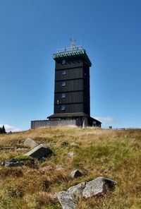 Low angle view of lighthouse against clear sky