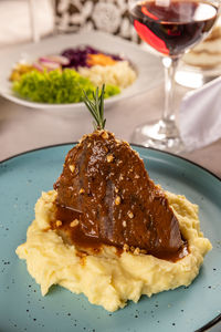 Close-up of food in plate on table