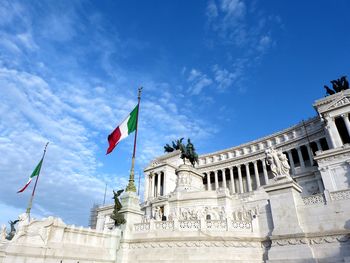 Low angle view of building against blue sky