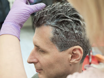 Close-up of man with eyes closed
