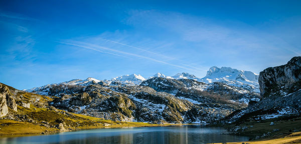 Scenic view of snowcapped mountains against sky