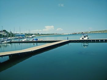 Boats in calm blue sea