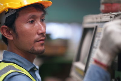 Side view of man looking away